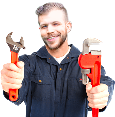 Smiling plumber holding wrench and pipe wrench